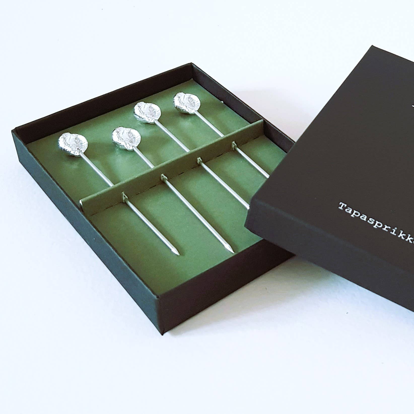 Tapasspieße mit Muschel