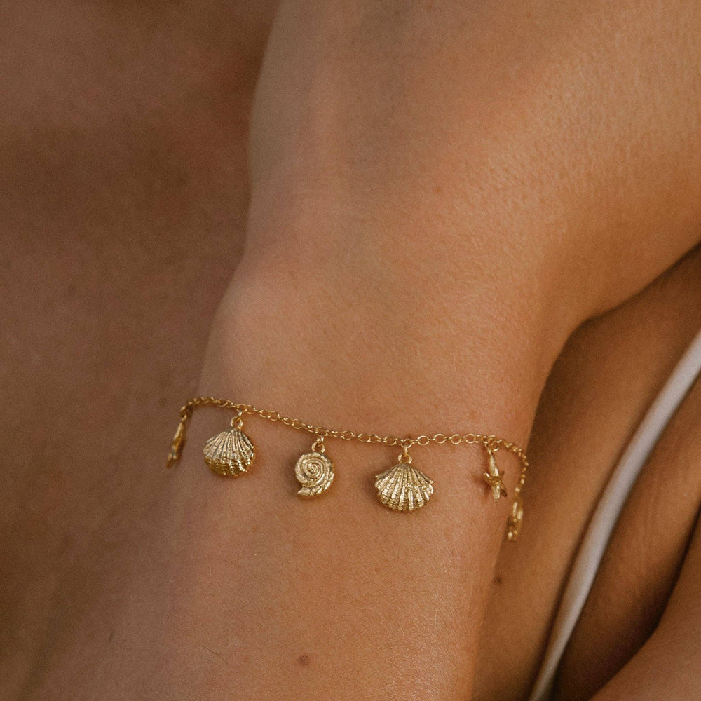 Vergoldetes Armkettchen Seesterne und Muscheln