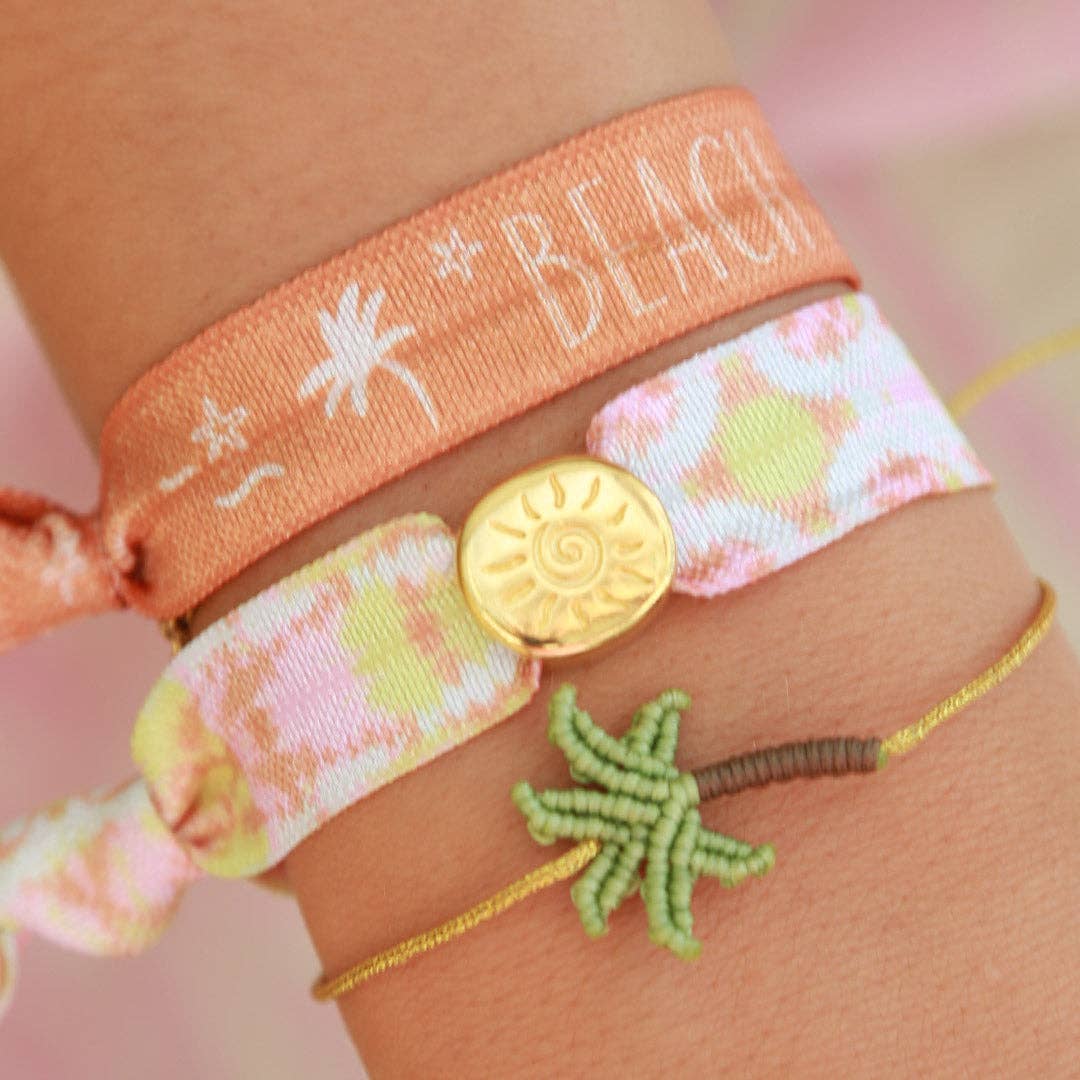 Armband mit geflochtenem Palmenanhänger