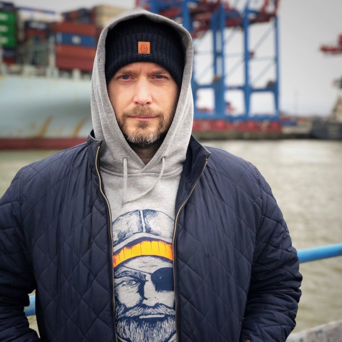 Kapuzenpullover Fischer orange - Ankerherz Verlag